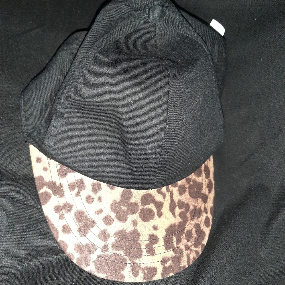 Solid Black hat with Cheetah design with velcro strap